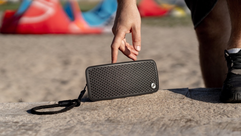 Audio Pro P5 wireless speaker on a beach front