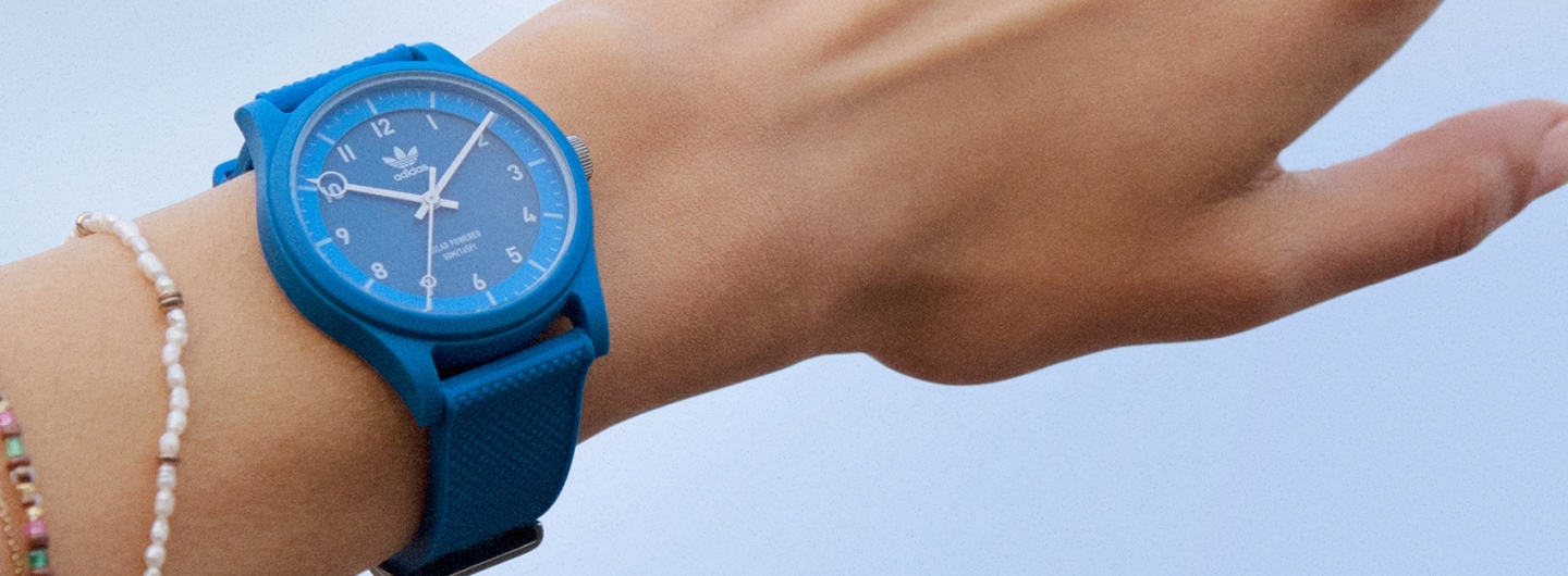A Timex Adidas Original blue Project Two watch on a wrist