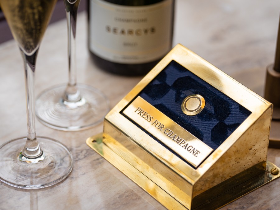 Push for Champagne button at St Pancras Champagne Bar by Searcys