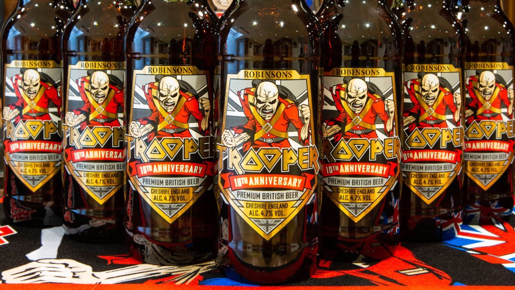 Bottles of Iron Maiden Trooper beer with special edition 10th anniversary label lined up in a row