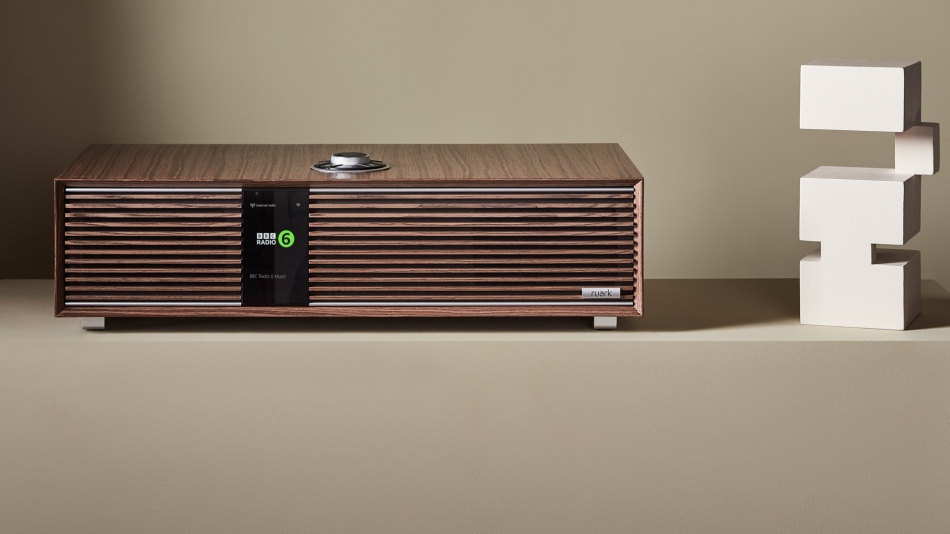 The stylish Ruark R410 music system sitting next to a piece of sculpture