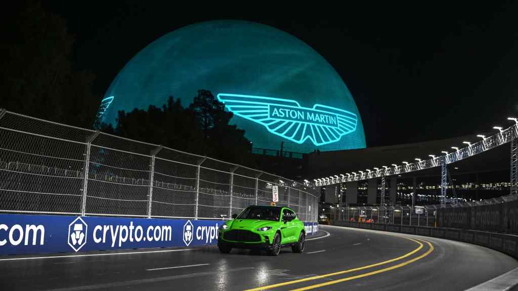 AstonMartin DBX707 in front of the Sphere on the F1 race track